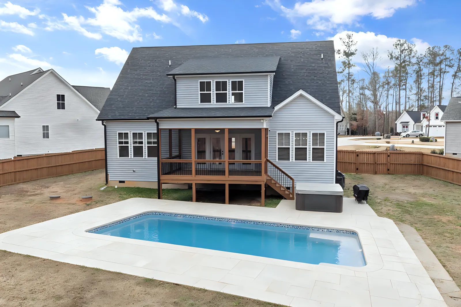 The same yard with an AI-designed pool and stone deck